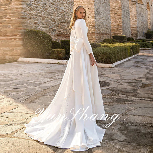 Yunshang Simple A-Line Wedding Dresses O-Neck Long Sleeve Bow Satin Pleat Floor-Length Bridal Gown Sweep Train Vestidos De Novia